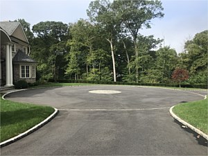 round inlay belgium block asphalt driveway large estate belgium block border blacktop paving cobblestone